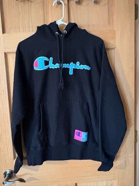 Champion Reverse Weave Black Hoodie with Blue Logo Tag